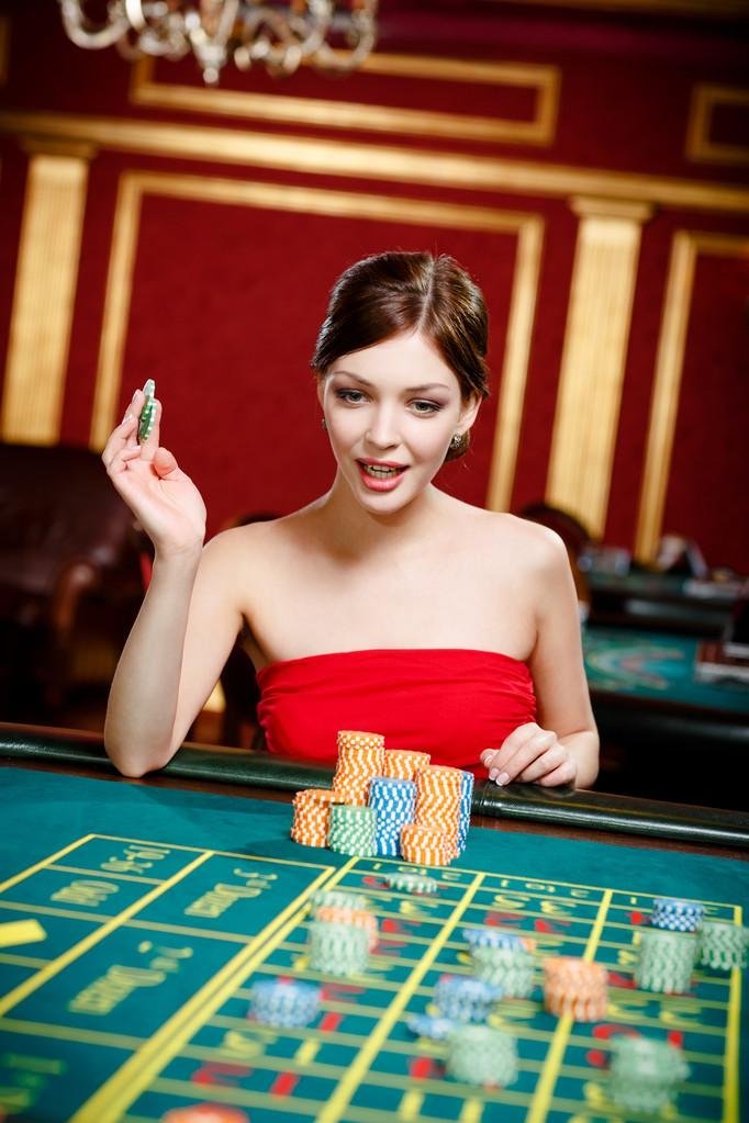 Live dealer studio at kapeka toto showing multi-camera Dragon Tiger table with professional croupier
